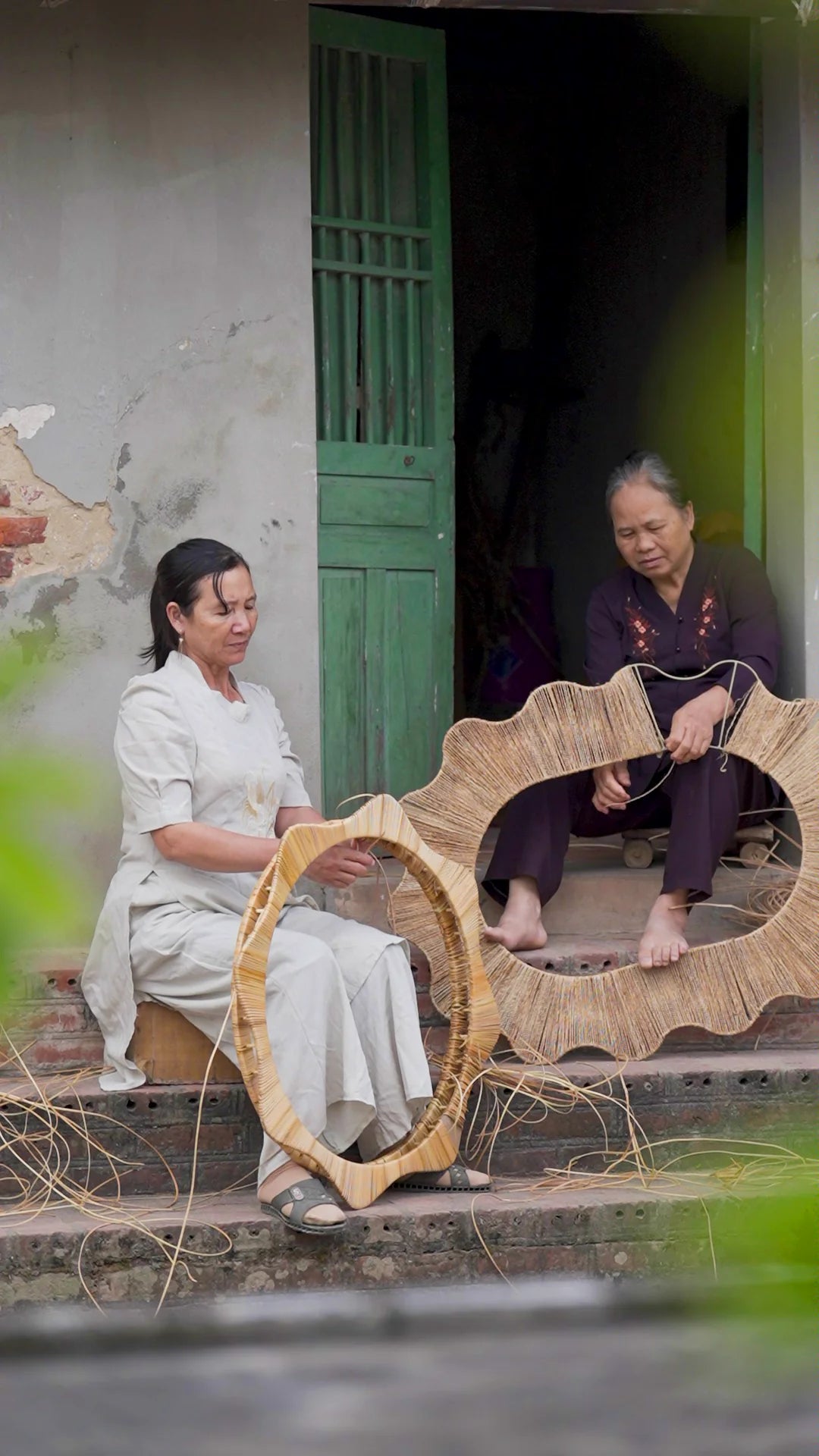 Two artisans at work in Kim Sơn